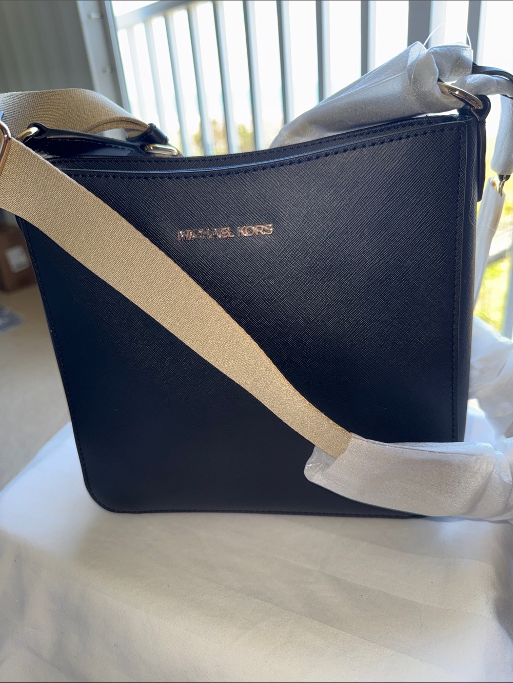 NWT - Michael Kors Black Leather Messenger with Beige Webbing Strap.